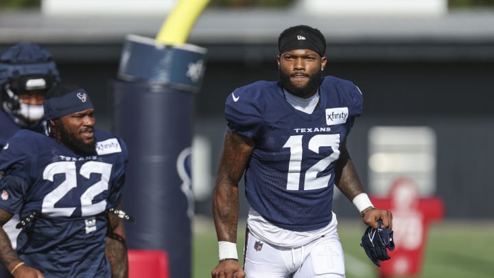 Jul 29, 2024; Houston, TX, USA; Houston Texans wide receiver Nico Collins (12) during training camp at Houston Methodist Training Center. Mandatory Credit: Troy Taormina-USA TODAY Sports