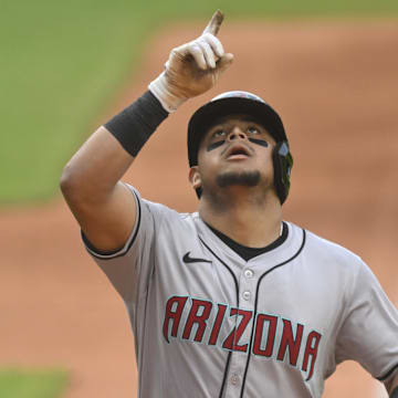 Aug 5, 2024; Cleveland, Ohio, USA; Arizona Diamondbacks catcher Gabriel Moreno (14) celebrates his solo home run in the first inning against the Cleveland Guardians at Progressive Field. Mandatory Credit: David Richard-Imagn Images