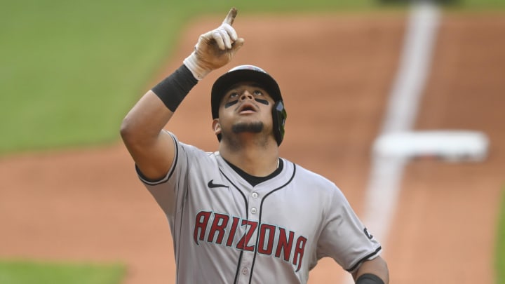 Aug 5, 2024; Cleveland, Ohio, USA; Arizona Diamondbacks catcher Gabriel Moreno (14) celebrates his solo home run in the first inning against the Cleveland Guardians at Progressive Field. Mandatory Credit: David Richard-USA TODAY Sports