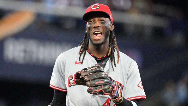 Aug 19, 2024; Toronto, Ontario, CAN; Cincinnati Reds shortstop Elly De La Cruz (44) reacts as he takes the field for the ninth inning against the Toronto Blue Jays at Rogers Centre. Mandatory Credit: Dan Hamilton-USA TODAY Sports