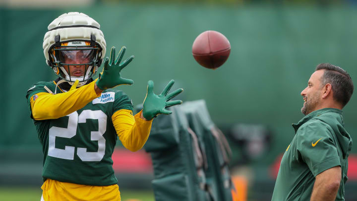 Green Bay Packers cornerback Jaire Alexander catches a pass at training camp.