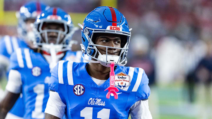 Jan 8, 2026; Glendale, AZ, USA; Mississippi Rebels wide receiver Deuce Alexander (11) against the Miami Hurricanes during the 2026 Fiesta Bowl and semifinal game of the College Football Playoff at State Farm Stadium. Mandatory Credit: Mark J. Rebilas-Imagn Images