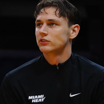 Jul 10, 2024; San Francisco, CA, USA; Miami Heat guard Pelle Larsson (9) on the sideline during the first quarter against the Los Angeles Lakers at Chase Center. Mandatory Credit: Kelley L Cox-USA TODAY Sports