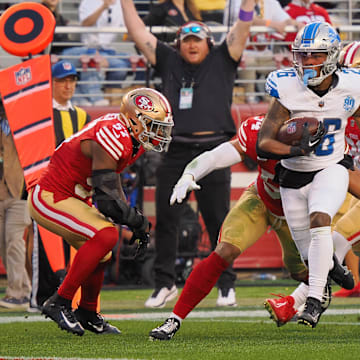 Jan 28, 2024; Santa Clara, California, USA; Detroit Lions running back Jahmyr Gibbs (26) runs with the ball for a touchdown San Francisco 49ers during the first half of the NFC Championship football game at Levi's Stadium. Mandatory Credit: Kelley L Cox-Imagn Images