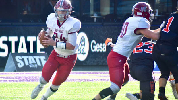 Okanogan's Carter Kuchenbuch led school to WIAA Class 2B football championship in 2023 at Husky Stadium.