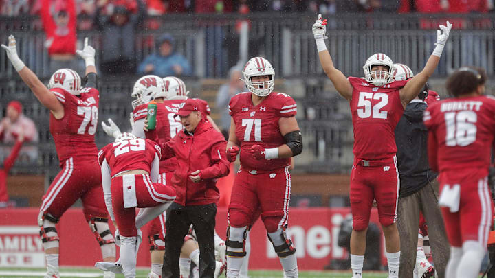 Wisconsin offensive lineman Riley Mahlman (71) and linebacker Kaden Johnson (52) celebrate after a replay review confirms a Badgers touchdown against Maryland on Saturday, Nov. 5, 2022, at Camp Randall Stadium in Madison.

Mjs Usat Wisconsin Vs Maryland Football 110522 1260 Ttm