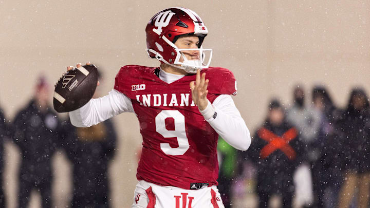 Indiana Hoosiers quarterback Kurtis Rourke (9) drops back to pass the ball in the first quarter against the Purdue Boilermakers at Memorial Stadium. Indiana Hoosiers quarterback Kurtis Rourke (9) drops back to pass the ball in the first quarter against the Purdue Boilermakers at Memorial Stadium.