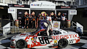 NASCAR Xfinity Series driver Connor Zilisch falls from car while celebrating after winning the Mission 200 at The Glen