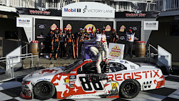 NASCAR Xfinity Series driver Connor Zilisch falls from car while celebrating after winning the Mission 200 at The Glen