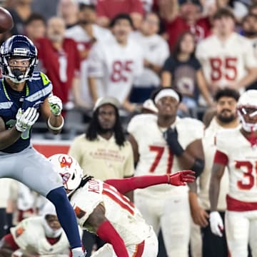 Sep 25, 2025; Glendale, Arizona, USA; Seattle Seahawks wide receiver Jaxon Smith-Njigba (11) against the Arizona Cardinals at State Farm Stadium. Mandatory Credit: Mark J. Rebilas-Imagn Images