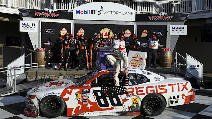 NASCAR Xfinity Series driver Connor Zilisch falls from car while celebrating after winning the Mission 200 at The Glen