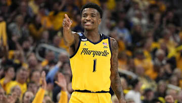 Feb 25, 2024; Milwaukee, Wisconsin, USA;  Marquette Golden Eagles guard Kam Jones (1) reacts after scoring a a basket during the second half against the Xavier Musketeers at Fiserv Forum. Mandatory Credit: Jeff Hanisch-Imagn Images