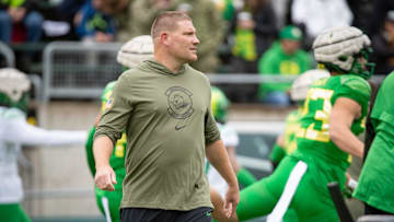 Oregon defensive coordinator Tosh Lupoi walks the field during the Oregon Ducks’ Spring Game on Saturday, April 27. 2024 at Autzen Stadium in Eugene, Ore.