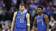 Jan 22, 2019; Dallas, TX, USA; Dallas Mavericks forward Luka Doncic (77) and  guard Dennis Smith Jr. (1) during the first quarter against the LA Clippers at American Airlines Center. Mandatory Credit: Kevin Jairaj-Imagn Images