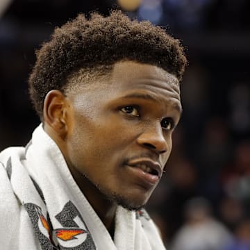 Dec 28, 2023; Minneapolis, Minnesota, USA; Minnesota Timberwolves guard Anthony Edwards (5) talks to a reporter after the game with Dallas Mavericks at Target Center. Mandatory Credit: Bruce Kluckhohn-USA TODAY Sports