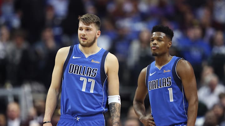 Jan 22, 2019; Dallas, TX, USA; Dallas Mavericks forward Luka Doncic (77) and  guard Dennis Smith Jr. (1) during the first quarter against the LA Clippers at American Airlines Center. Mandatory Credit: Kevin Jairaj-Imagn Images