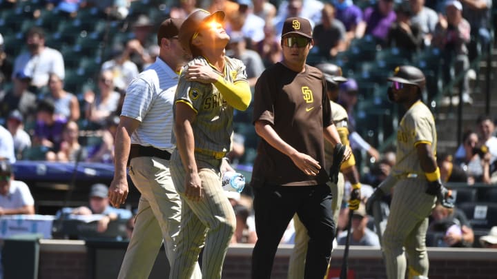 Aug 18, 2024; Denver, Colorado, USA; San Diego Padres shortstop Ha-Seong Kim (7) leaves the game after an injury in the third inning against the Colorado Rockies at Coors Field.