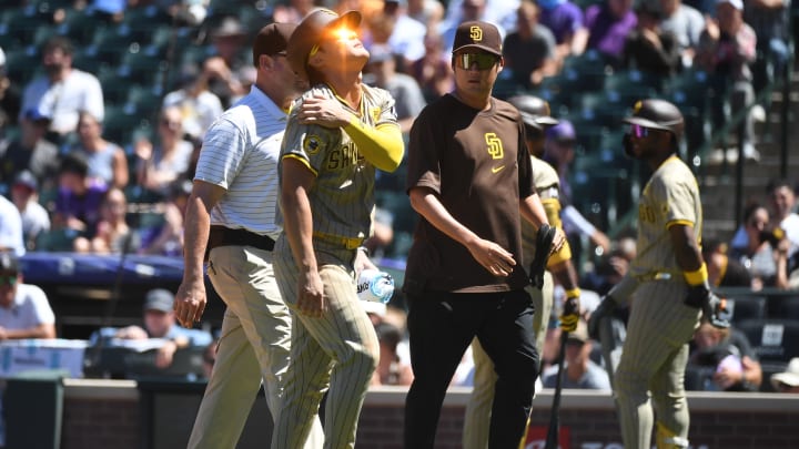 Aug 18, 2024; Denver, Colorado, USA; San Diego Padres shortstop Ha-Seong Kim (7) leaves the game after an injury in the third inning against the Colorado Rockies at Coors Field. Mandatory Credit: Christopher Hanewinckel-USA TODAY Sports