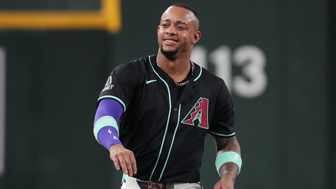 Sep 17, 2025; Phoenix, Arizona, USA; Arizona Diamondbacks second base Ketel Marte (4) reacts against the San Francisco Giants in the first inning at Chase Field.