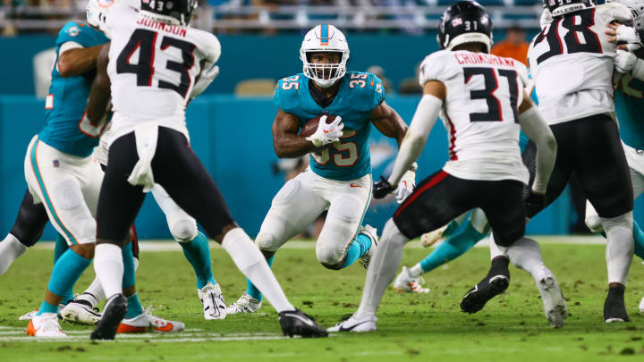 Miami Dolphins running back Chris Brooks (35) runs with the football against the Atlanta Falcons during the third quarter at Hard Rock Stadium in the preseason.