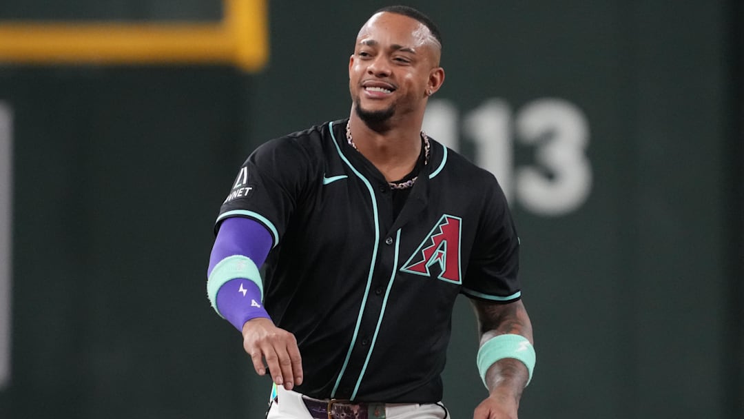 Sep 17, 2025; Phoenix, Arizona, USA; Arizona Diamondbacks second base Ketel Marte (4) reacts against the San Francisco Giants in the first inning at Chase Field. Mandatory Credit: Rick Scuteri-Imagn Images
