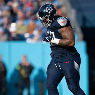 Tennessee Titans defensive tackle Jeffery Simmons (98) heads off the field after being helped up late in the fourth quarter of their game against the Indianapolis Colts during their game at Nissan Stadium in Nashville, Tenn., Sunday, Dec. 3, 2023. Simmons left the game after a couple more plays.