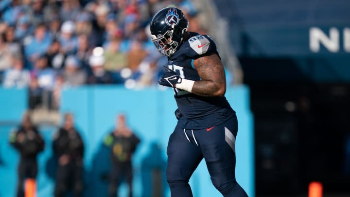 Tennessee Titans defensive tackle Jeffery Simmons (98) heads off the field after being helped up late in the fourth quarter of their game against the Indianapolis Colts during their game at Nissan Stadium in Nashville, Tenn., Sunday, Dec. 3, 2023. Simmons left the game after a couple more plays.