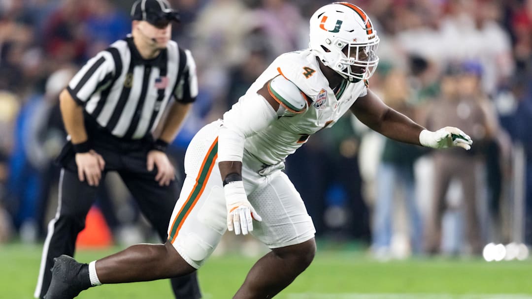 Jan 8, 2026; Glendale, AZ, USA; Miami Hurricanes defensive lineman Rueben Bain Jr. (4) against the Mississippi Rebels during the 2026 Fiesta Bowl and semifinal game of the College Football Playoff at State Farm Stadium. Mandatory Credit: Mark J. Rebilas-Imagn Images