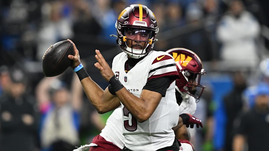 Washington Commanders quarterback Jayden Daniels throws a pass during the first quarter of a game against the Detroit Lions.