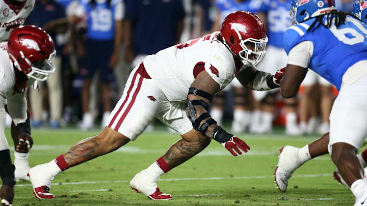 Sep 13, 2025; Oxford, Mississippi, USA; Arkansas Razorback defensive lineman Ian Geffrard (95) defends during the third quarter during the third quarter at Vaught-Hemingway Stadium. Mandatory Credit: Petre Thomas-Imagn Images