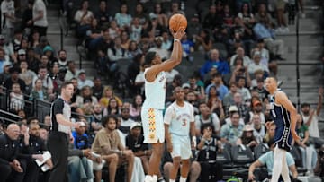 Mar 12, 2025; San Antonio, Texas, USA; San Antonio Spurs guard De'Aaron Fox (4) shoots in the second half against the Dallas Mavericks at Frost Bank Center. Mandatory Credit: Daniel Dunn-Imagn Images
