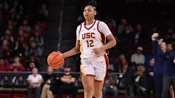 Jan 12, 2025; Los Angeles, California, USA; USC Trojans guard JuJu Watkins (12) dribbles the ball downcourt during the first quarter against the Penn State Nittany Lions at Galen Center. Mandatory Credit: Robert Hanashiro-Imagn Images