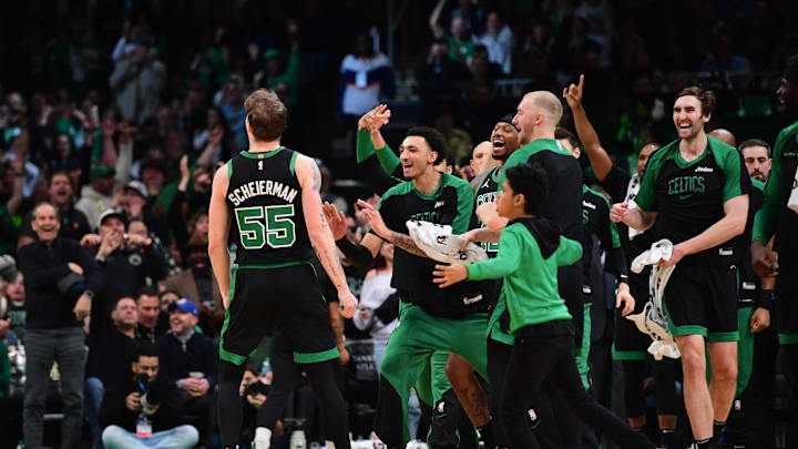 Mar 18, 2025; Boston, Massachusetts, USA; Boston Celtics forward Baylor Scheierman (55) reacts with the bench after hitting a three point shot during the second half at TD Garden. Mandatory Credit: Bob DeChiara-Imagn Images