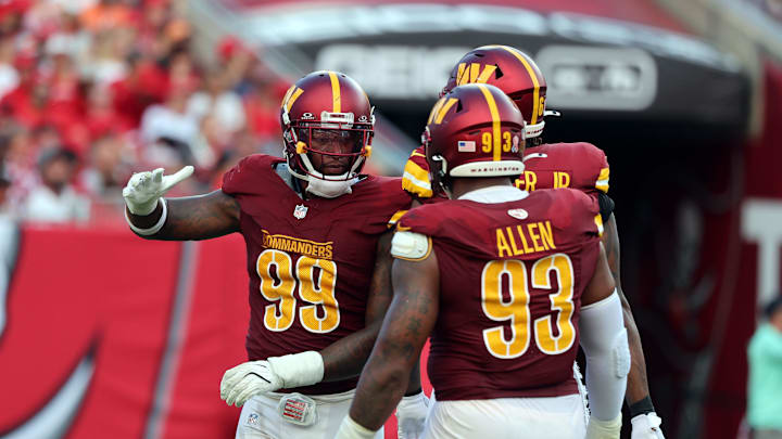 Sep 8, 2024; Tampa, Florida, USA; Washington Commanders defensive end Clelin Ferrell (99) celebrates after he made sack against the Tampa Bay Buccaneers  during the second half at Raymond James Stadium. Mandatory Credit: Kim Klement Neitzel-Imagn Images