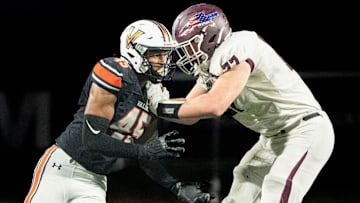 Waterloo West's Carson Nielsen blocks against West Des Moines Valley's Jarome Horn during the West Des Moines Valley and Waterloo West football game at Valley Stadium on Friday, Oct. 11, 2024, in West Des Moines.
