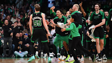 Mar 18, 2025; Boston, Massachusetts, USA; Boston Celtics forward Baylor Scheierman (55) reacts with the bench after hitting a three point shot during the second half at TD Garden. Mandatory Credit: Bob DeChiara-Imagn Images