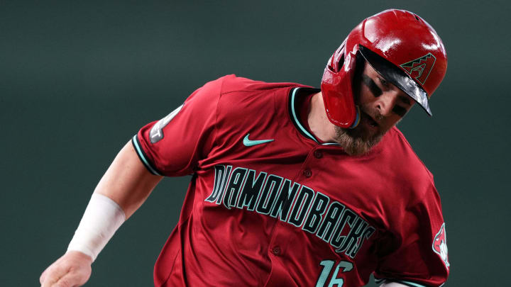 May 5, 2024; Phoenix, Arizona, USA; Arizona Diamondbacks catcher Tucker Barnhart (16) rounds third base and scores a run against the San Diego Padres during the fourth inning at Chase Field. Mandatory Credit: Joe Camporeale-USA TODAY Sports