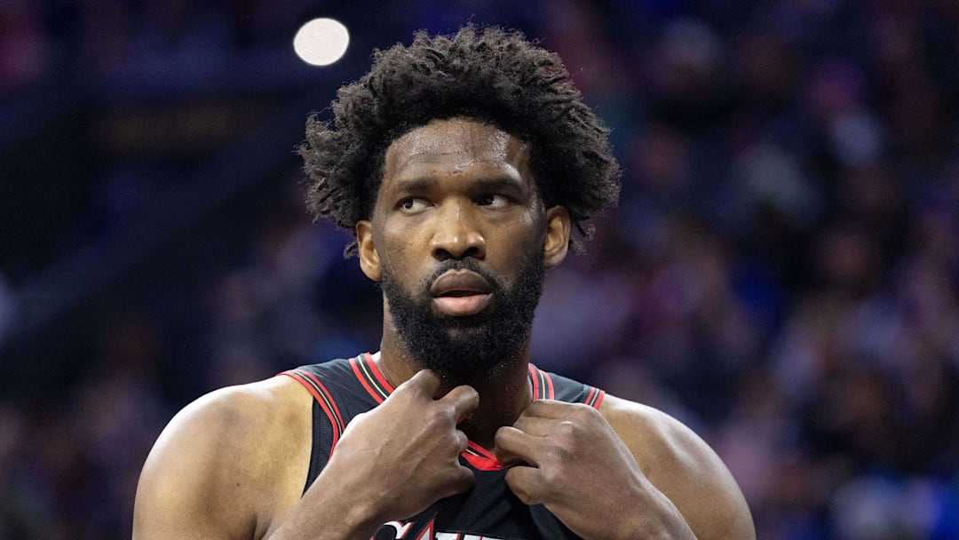Dec 23, 2025; Philadelphia, Pennsylvania, USA; Philadelphia 76ers center Joel Embiid (21) looks on against the Brooklyn Nets during the first quarter at Xfinity Mobile Arena. Mandatory Credit: Bill Streicher-Imagn Images