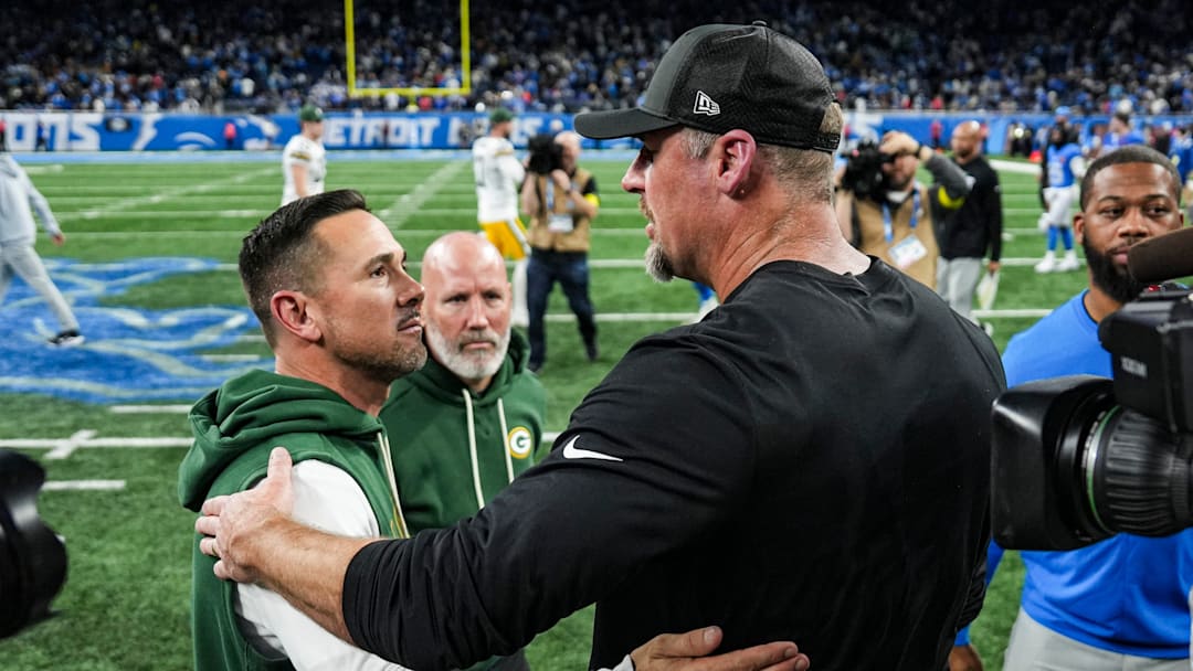 Detroit Lions head coach Dan Campbell, right, shakes hands with Green Bay Packers head coach Matt LaFleur after 31-24 loss at Ford Field in Detroit on Thursday, Nov. 27, 2025.