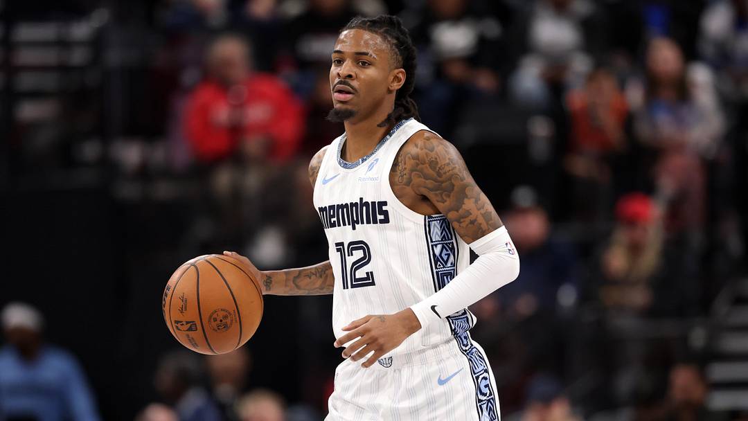 Dec 15, 2025; Inglewood, California, USA;  Memphis Grizzlies guard Ja Morant (12) brings the ball up court during the third quarter against the Los Angeles Clippers at Intuit Dome.