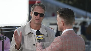 Nov 28, 2025; Starkville, Mississippi, USA; Mississippi Rebels head coach Lane Kiffin speaks with ESPN reporter Marty Smith before the game against the Mississippi State Bulldogs at Davis Wade Stadium at Scott Field. Mandatory Credit: Petre Thomas-Imagn Images