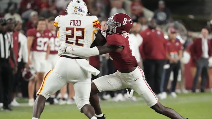 Sep 6, 2025; Tuscaloosa, Alabama, USA;  Alabama defensive back Cam Calhoun (9) attempts to tackle UL Monroe running back D'Shaun Ford (22) at Saban Field at Bryant-Denny Stadium. Alabama defeated UL Monroe 73-0. Mandatory Credit: Gary Cosby Jr.-Imagn Images