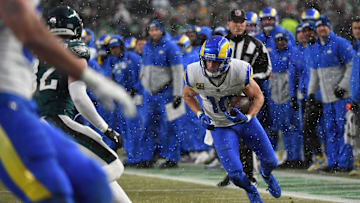 Jan 19, 2025; Philadelphia, Pennsylvania, USA; Los Angeles Rams wide receiver Cooper Kupp (10) carries the ball in the first half against the Philadelphia Eagles in a 2025 NFC divisional round game at Lincoln Financial Field. Mandatory Credit: Eric Hartline-Imagn Images