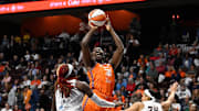 Sep 10, 2025; Uncasville, Connecticut, USA; Connecticut Sun center Tina Charles (31) shoots over Atlanta Dream guard Rhyne Howard (10) during the second half at Mohegan Sun Arena.