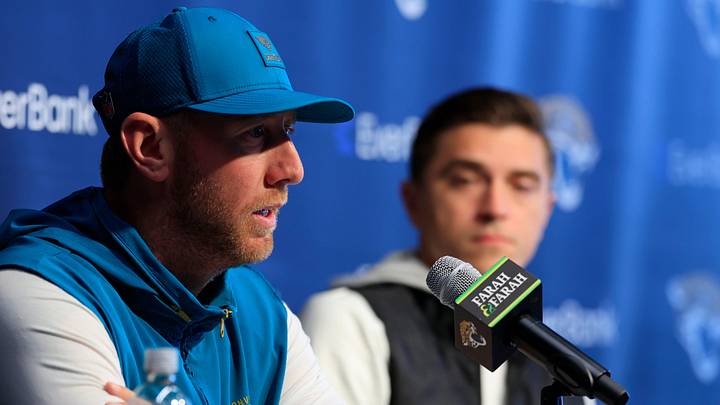Jacksonville Jaguars head coach Liam Coen speaks during a press conference as general manager James Gladstone looks on at the Miller Electric Center, Wednesday, Jan. 14, 2026, in Jacksonville, Fla.