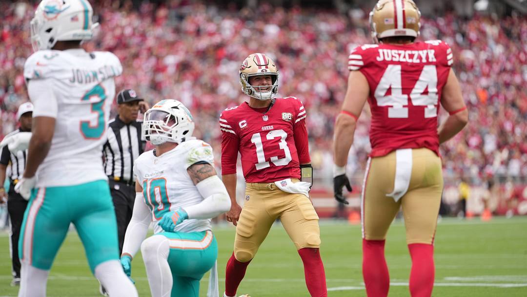 San Francisco 49ers quarterback Brock Purdy (13) celebrates after running for a touchdown against the Miami Dolphins in the second quarter at Levi's Stadium.