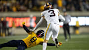 Sep 13, 2025; Berkeley, California, USA; California Golden Bears defensive back Jasiah Wagoner (8) reaches out to tackle Minnesota Golden Gophers kick returner Koi Perich (3) during the third quarter at California Memorial Stadium. Mandatory Credit: D. Ross Cameron-Imagn Images