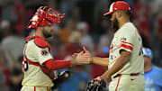 Sep 24, 2025; Anaheim, California, USA;  Los Angeles Angels catcher Sebastian Rivero (38) congratulates relief pitcher Kenley Jansen (74) after his 28th save of the season in the ninth inning against the Kansas City Royals at Angel Stadium. Mandatory Credit: Jayne Kamin-Oncea-Imagn Images