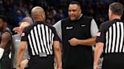 Feb 11, 2024; Memphis, Tennessee, USA; Tulane Green Wave head coach Ron Hunter reacts toward the officials during the first half against the Memphis Tigers at FedExForum.