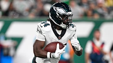 Aug 22, 2025; East Rutherford, New Jersey, USA; Philadelphia Eagles running back Montrell Johnson Jr. (34) runs with the ball during the first quarter against the New York Jets at MetLife Stadium. Mandatory Credit: Mark Smith-Imagn Images